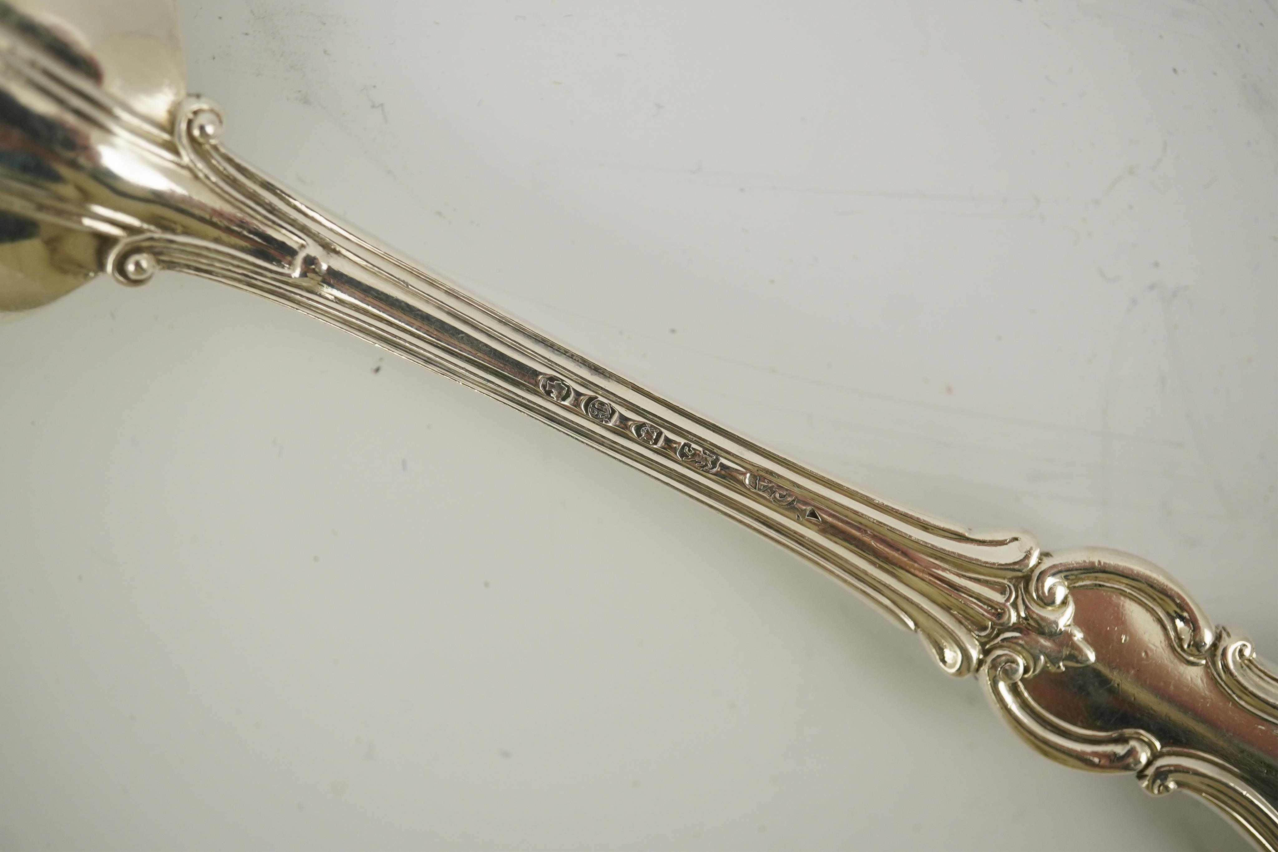 Twenty four items of Victorian silver double struck Prince Albert pattern flatware by George Adams